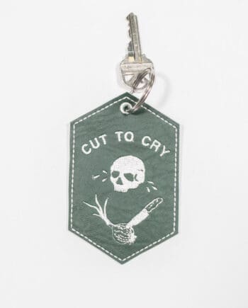 Cut to cry embroidered keychain by crewel and unusual