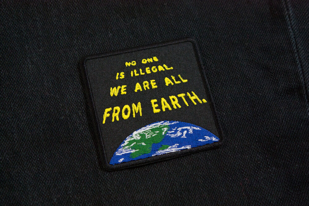 we are all from earth embroidered patch