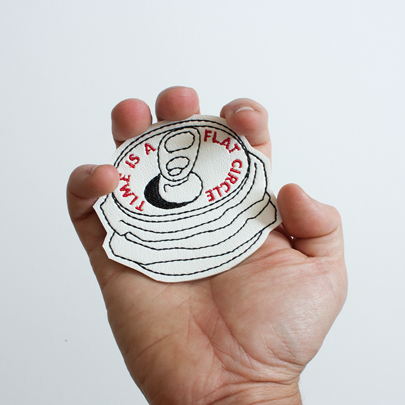 Time is a flat circle embroidered iron on patch by Crewel and Unusual