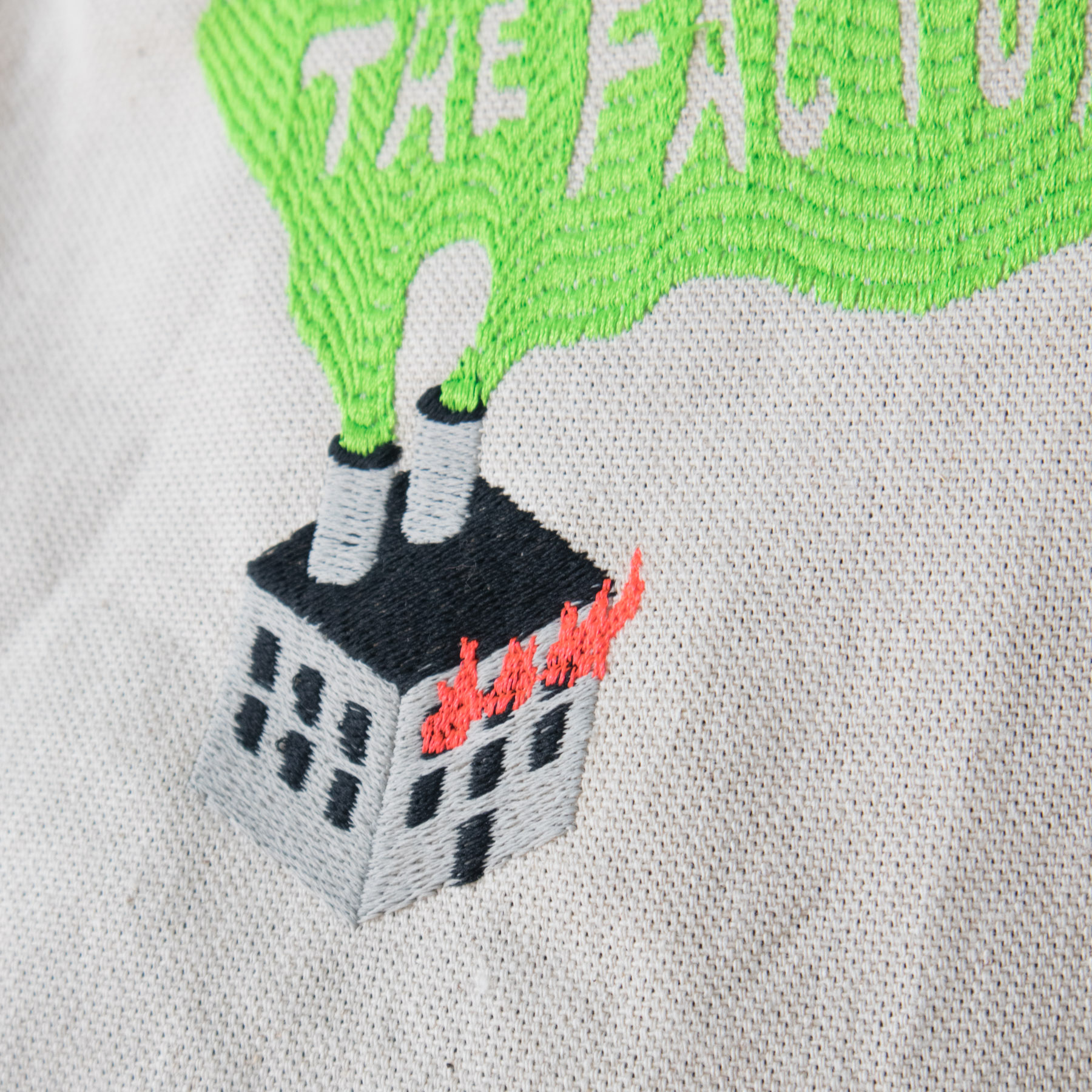 Product image - canvas tote bag with Burn Down the Factory embroidery design detail