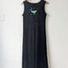 the back of a long black velvet dress embroidered on the top middle back with a luna moth surrounded by a crescent moon and several small stars.