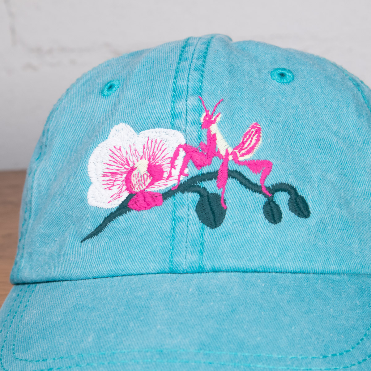 Discover the Orchid Mantis Dad Hat: Soft Pink Delight - Crewel and