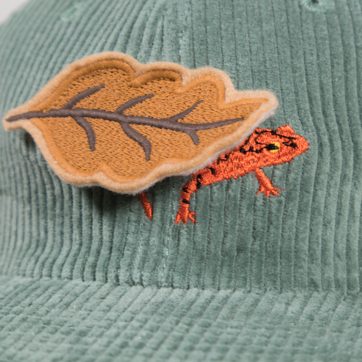 Hiding Salamander Corduroy Cap - Crewel and Unusual